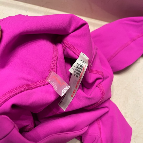 Free people movement wave rider leggings has pockets. Magenta size xs - Picture 8 of 11